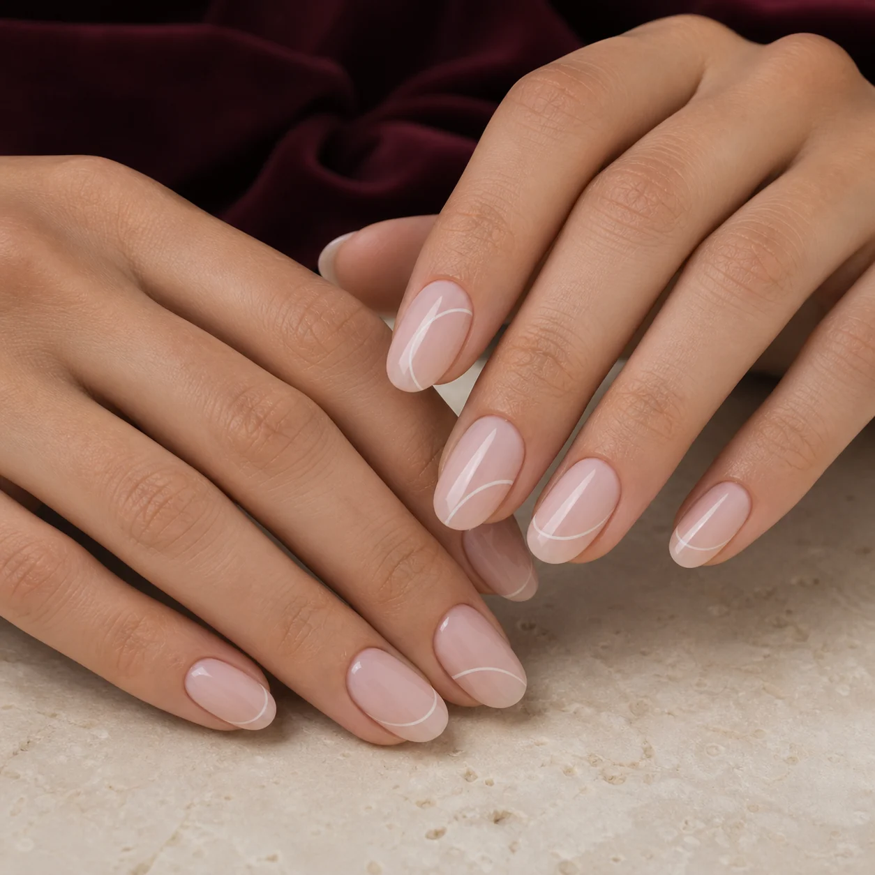 Milky blush manicure with fine white line art